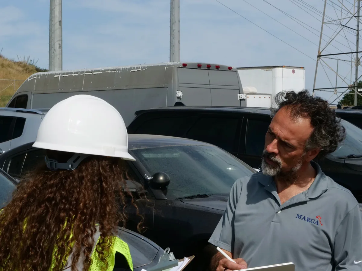 Peter Scura listening to a customer